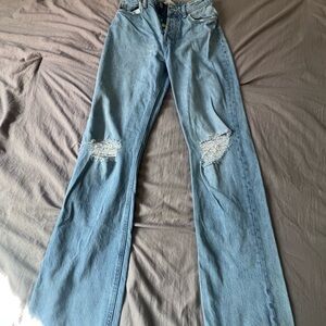 Women's Distressed Blue Jeans